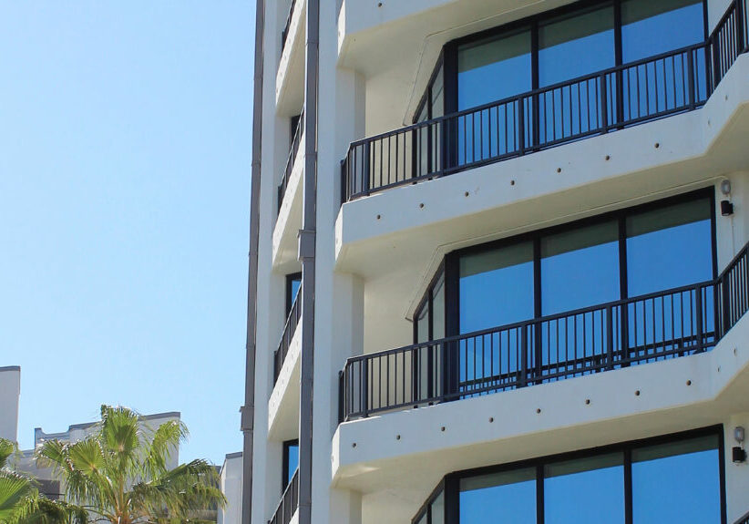 Durable powder-coated aluminum balcony railing safeguards oceanfront skyscraper decks